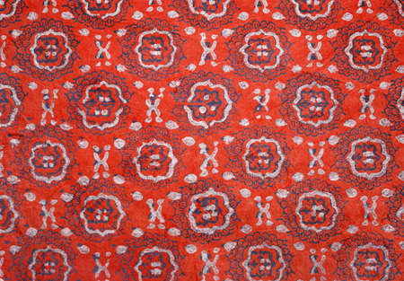 Red paper background with Oriental designの写真素材