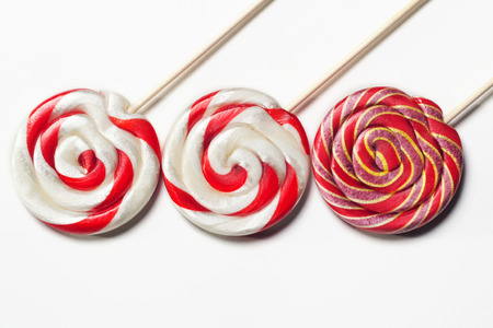 Lollipops on a stick on a white background. Flat lay. Shallow DOFの写真素材