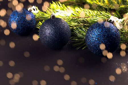 Christmas balls on the branches fir. With Golden bokeh.の写真素材