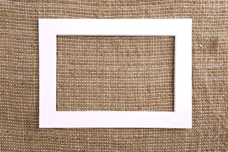 White frame-layout on linen napkin. Blank for design.の写真素材