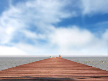 wooden jetty on the beautiful sea with blue sky and cloudsの写真素材