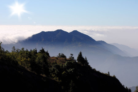 mountain mist cloud and the sunの写真素材
