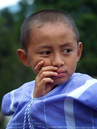 Portrait of unidentified hill tribe children with traditional clothes in his village on December 05, 2010 in Chiang Mai, Thailand.のeditorial素材