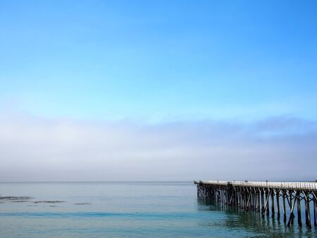 The fishing pier seen butiful blue skyの写真素材