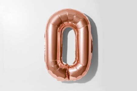 Letter O, Rose gold foil balloon alphabet isolated on a white background with Clipping Pathの写真素材