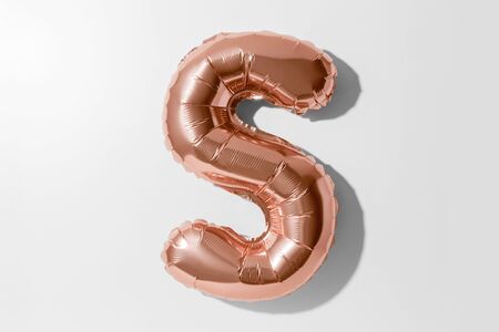 Letter S, Rose gold foil balloon alphabet isolated on a white background with Clipping Pathの写真素材