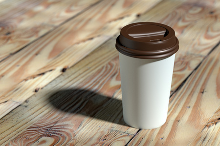 Paper coffee cup with brown lid mock-up on wood table 3d renderingの写真素材