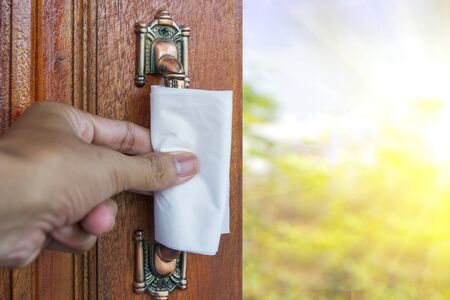 Open the door to protect the virus, protects hand from direct contact with door handle. Paper napkin...