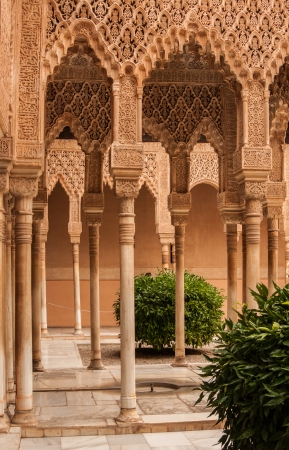 Ornamental plasterwork in an arcade in the Nasrid palaces, at the Alhambra, Granada, Spain.のeditorial素材