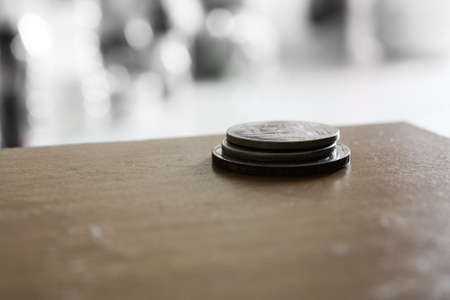 photo of  tree Coin on wooden floor.の写真素材