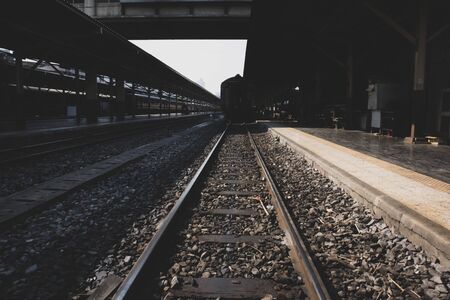Railway line track. in train station. vintage transportation. way to travel.の写真素材