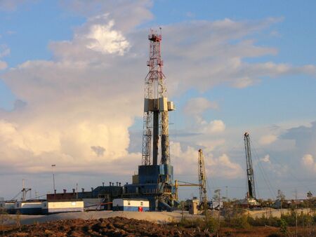Drilling rig on a summer evening. Oil production.の写真素材