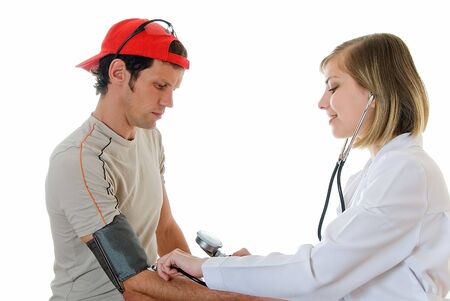young pretty doctor measuring sportsmans blood pressure