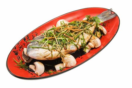 red plate with fried crusian on whiteの写真素材