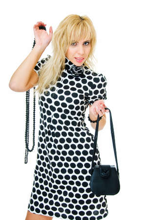 young pretty woman with beads and dolly bag  の写真素材
