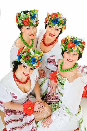 four ukrainian young women dancers on whiteの写真素材