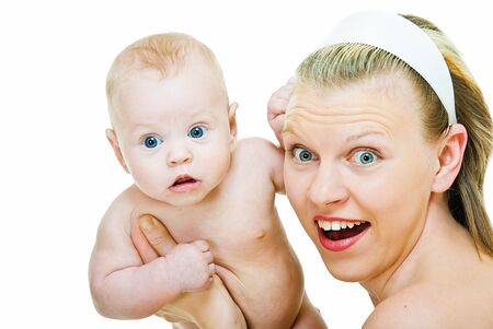 astonished smiling happy mother and her baby on whiteの写真素材