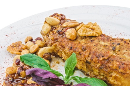 cat-fish in honey-nut sauce on plateの写真素材