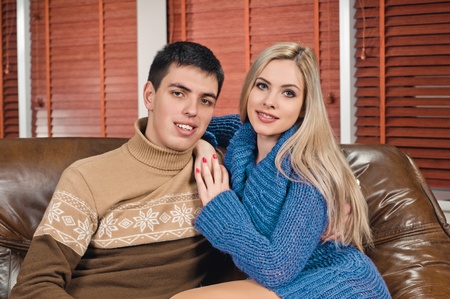 portrait of young couple at the modern apartmentの写真素材