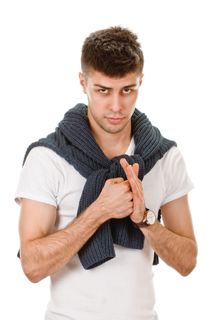 young man showing negative sign on white backgroundの写真素材