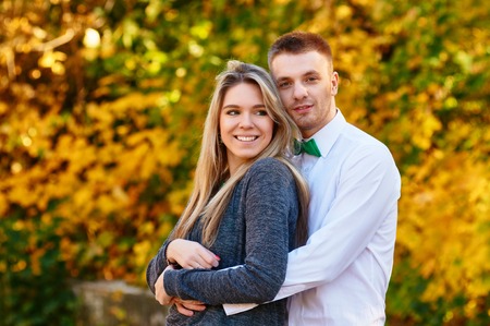 happy autumn couple in love portrait. outdoorの写真素材