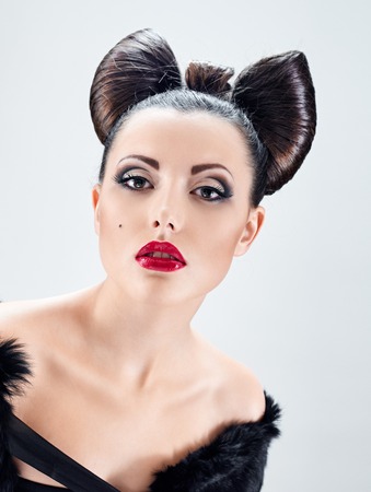 Fashion Model Girl Portrait. Creative Hairstyle. Hairdo. Make up. coiffure bowの写真素材