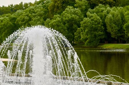 part of fountain and space green trees in Tsaritsyno park. Moskow, Russia.の写真素材