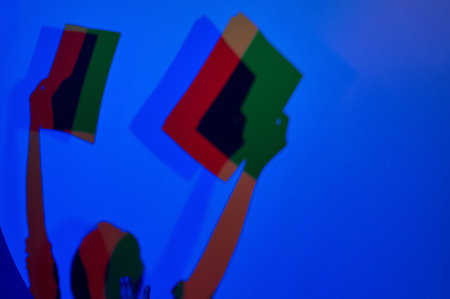 shadows of hands icons. experience to create colored shadows. Eksperimentanium Moscow Russiaの写真素材