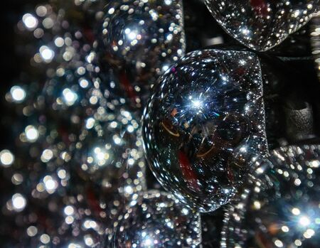 mirrored balls with a lot of reflections. focus is on foregroundの写真素材