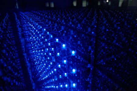 LED background with dozens transparent blue LEDs