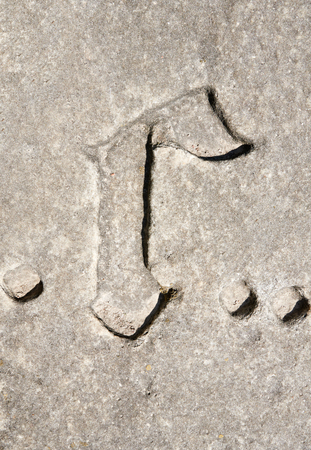 Cyrillic symbol G on granite slab. Ukraine Zolochev Carpathianの写真素材