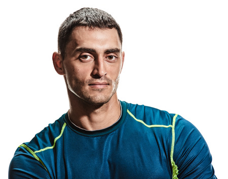 portrait of a gorgeous male model in t-shirt standing on white backgroundの写真素材