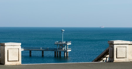 Burgas Bridge. sea and rocky shore in autumnの写真素材