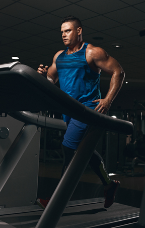 sporty Man on running trackの写真素材