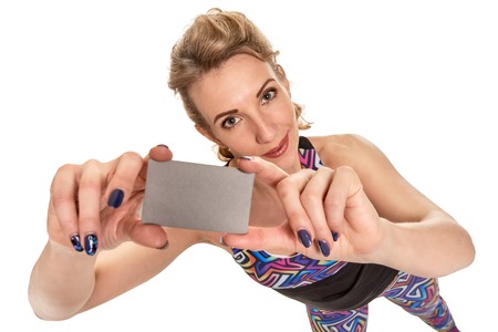 Sportswoman holding cardの写真素材