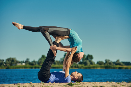 Pair yoga outdoorの写真素材