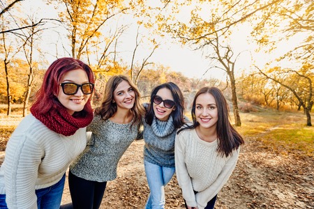 Resting in autumn parkの写真素材