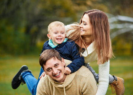 Family playing in parkの写真素材