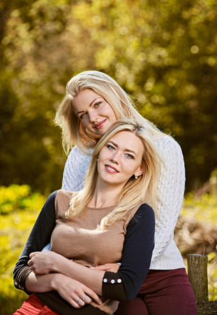 Happy girlfriends huggingの写真素材