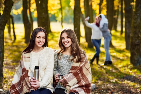 Picnic in autumn parkの写真素材