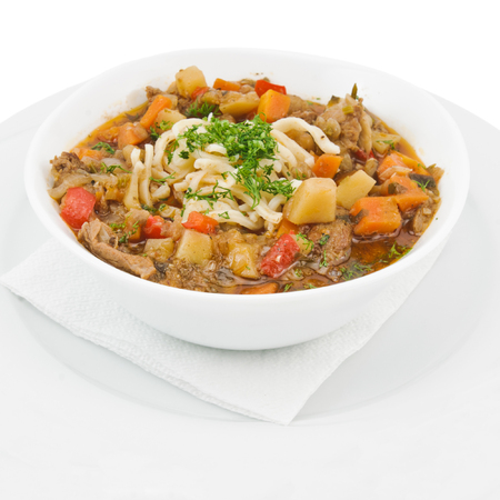 Portion of traditional asian noodle lagman with vegetables and meat. photo with a square aspect ratioの写真素材