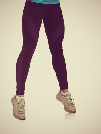 Womans legs in sportswearの写真素材