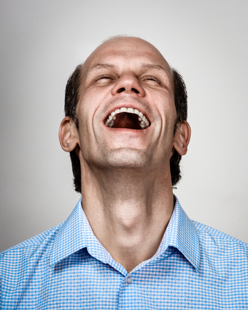 Cheerful laughing man