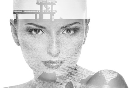 Portrait with double exposure of attractive elegant woman and oceanの写真素材
