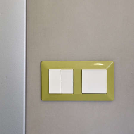 Electric switch on wall