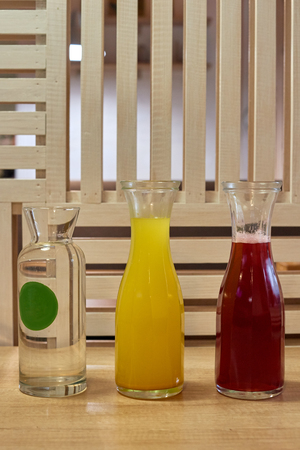 Glasses and bottles with juiceの写真素材
