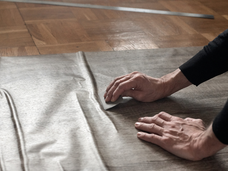 Removing air from filmの写真素材