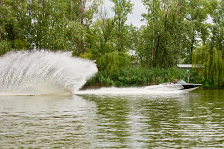 Young woman waterskiingのeditorial素材