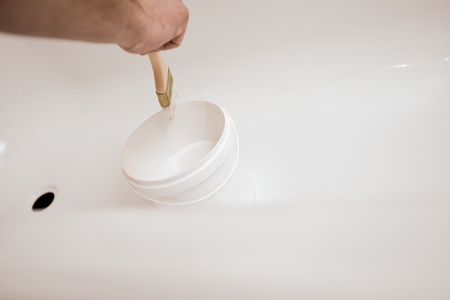 Bucket with acrylic on bathの写真素材