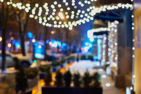 Evening city with garlands